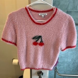 Short sleeved fuzzy sweater
